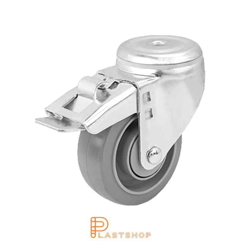 Länkipyörä jarrulla, keskireikä, pyörän halkaisija 100 mm, rakennuskorkeus 132 mm, navassa PA6, pehmeä ura ElastoGum:sta harmaassa värissä. 225 kg kantavuus, palloliukusuoja