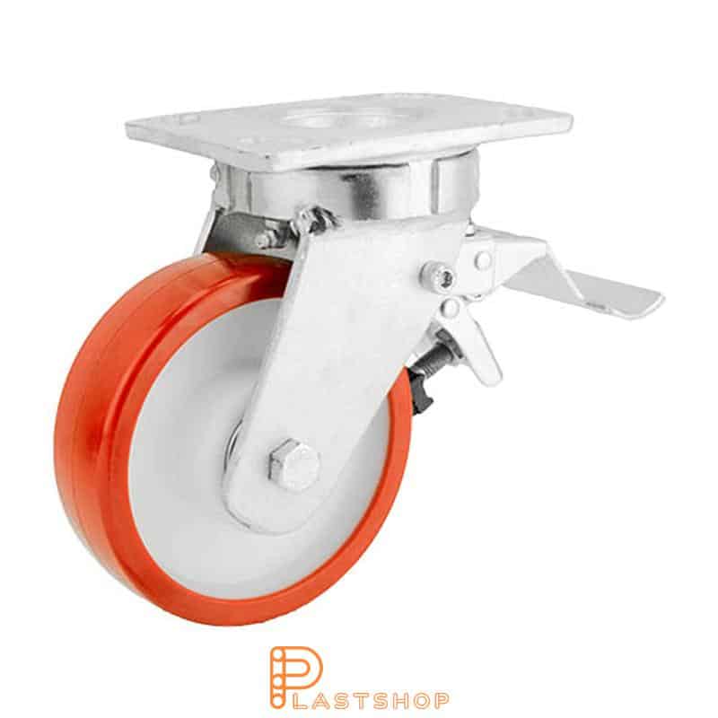 Lenkki pyörä jarrulla, laippa, pyörän halkaisija 150 mm, rakennuskorkeus 200 mm, navat PA6:sta pehmeällä uralla PUR:sta punaisessa värissä. 600 kg kantavuus, kaksi palloalaakeria