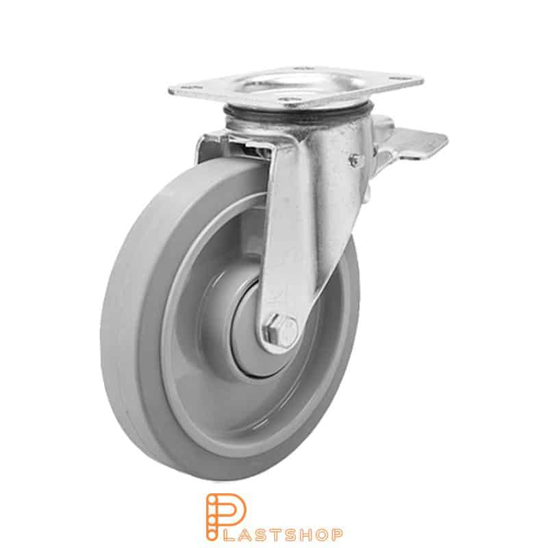 Lenkki pyörä jarrulla, laippa, pyörän halkaisija 160 mm, rakennuskorkeus 196 mm, navat PA6:sta pehmeällä uralla ElastoGum:ista harmaassa värissä. 350 kg kantavuus, kaksi palloalaakeria